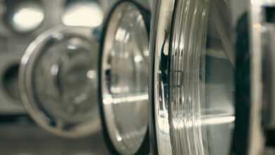 a row of silver and black washing machines